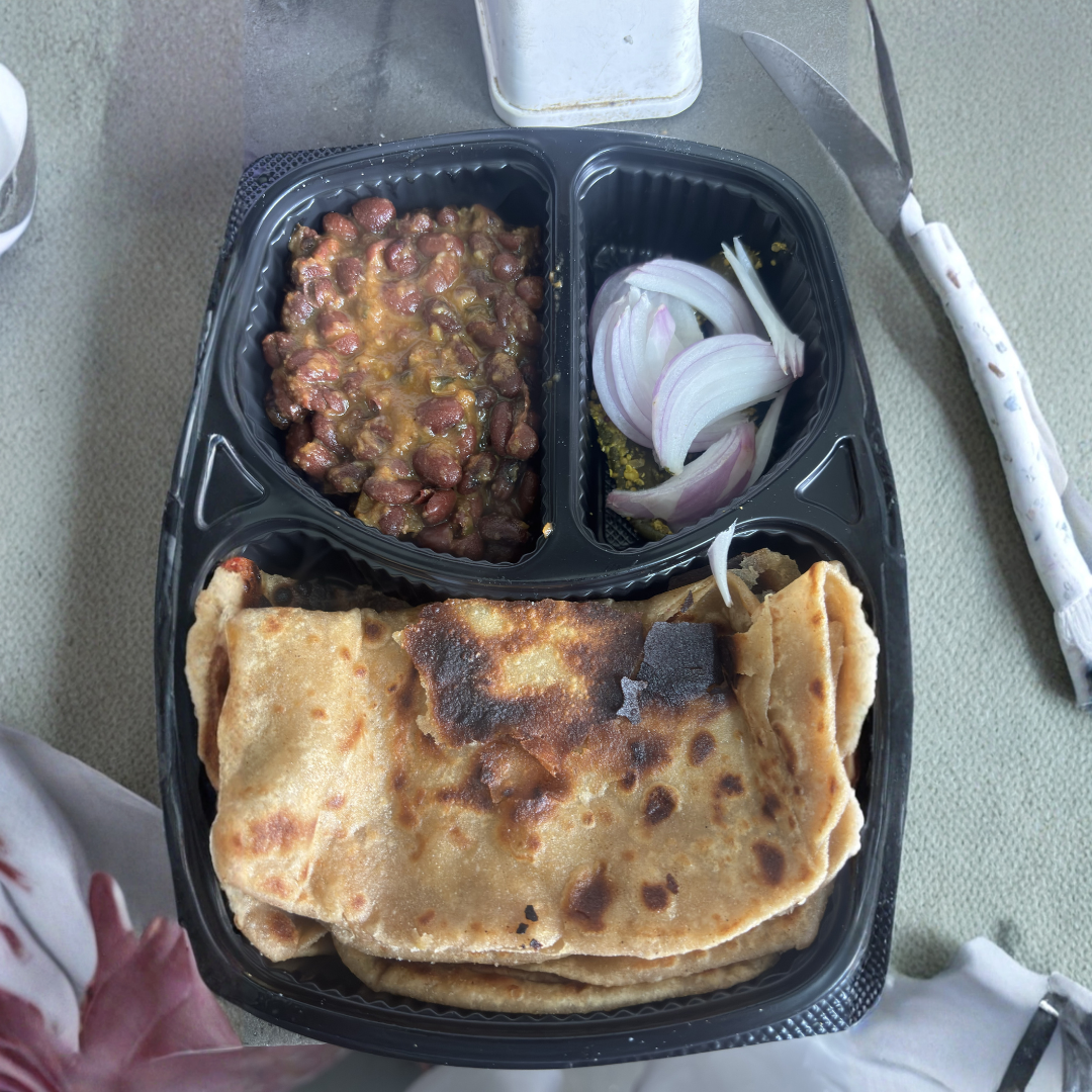 Zomato order rating screenshot — rajma with roti